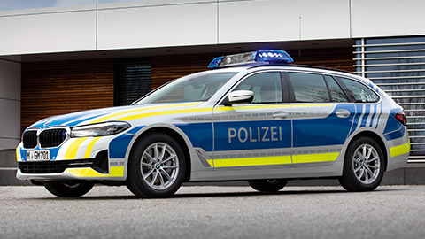 BMW 5 Series Touring G31LCI police vehicle 7/8 sideview parking